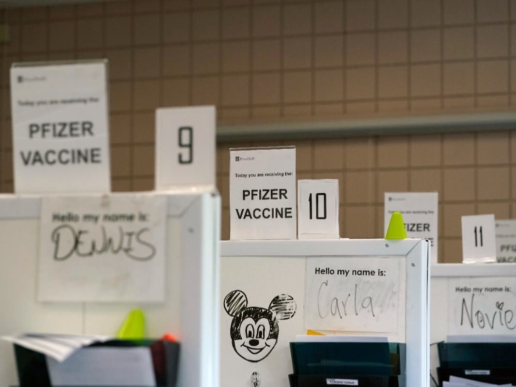 Names of vaccinators are posted on cubicles at a COVID-19 vaccination clinic at PeaceHealth St. Joseph Medical Center Thursday, June 3, 2021, in Bellingham, Wash