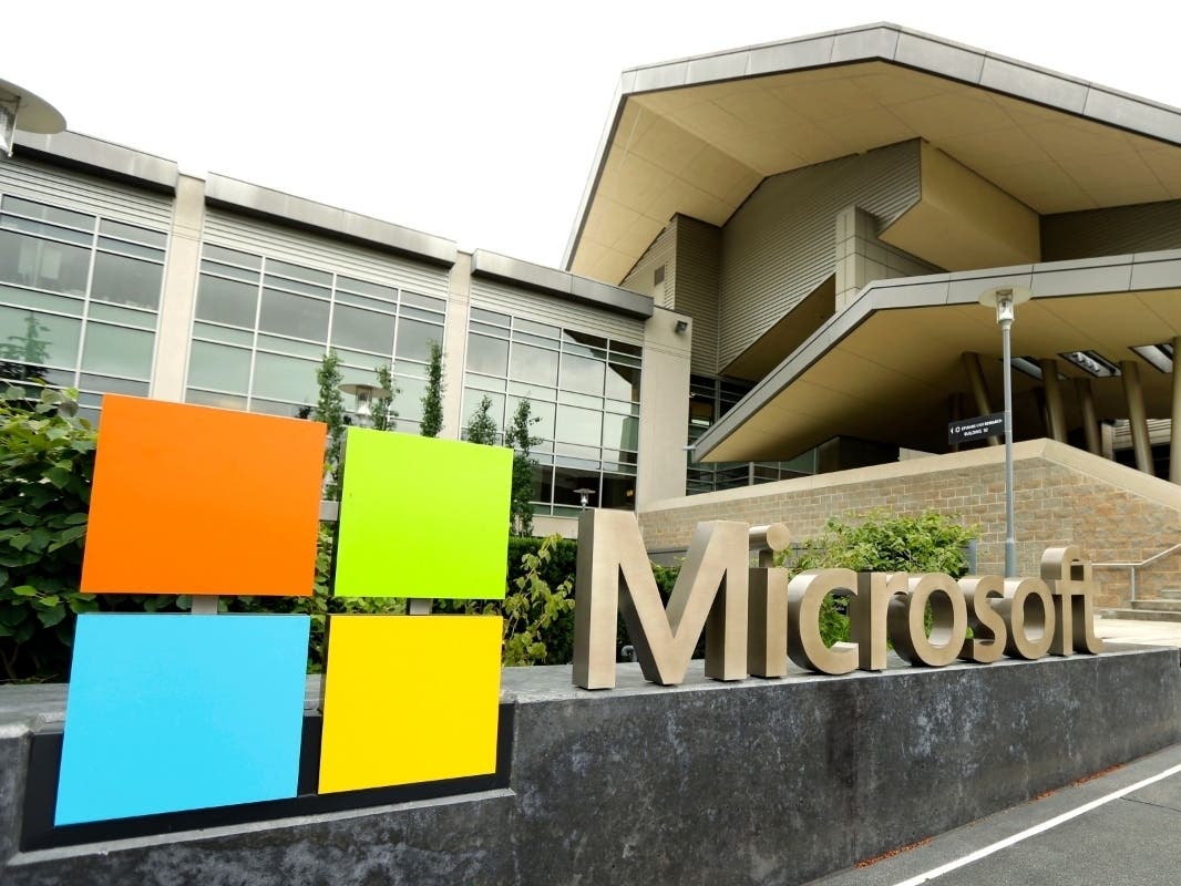 In this July 3, 2014, file photo, the Microsoft Corp. logo is displayed outside the Microsoft Visitor Center in Redmond, Wash.