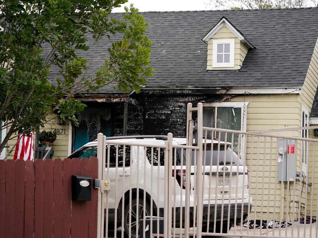 Fire damage covers the front of the house of San Diego County Supervisor Nathan Fletcher Wednesday, Jan. 12, 2022, in San Diego. 