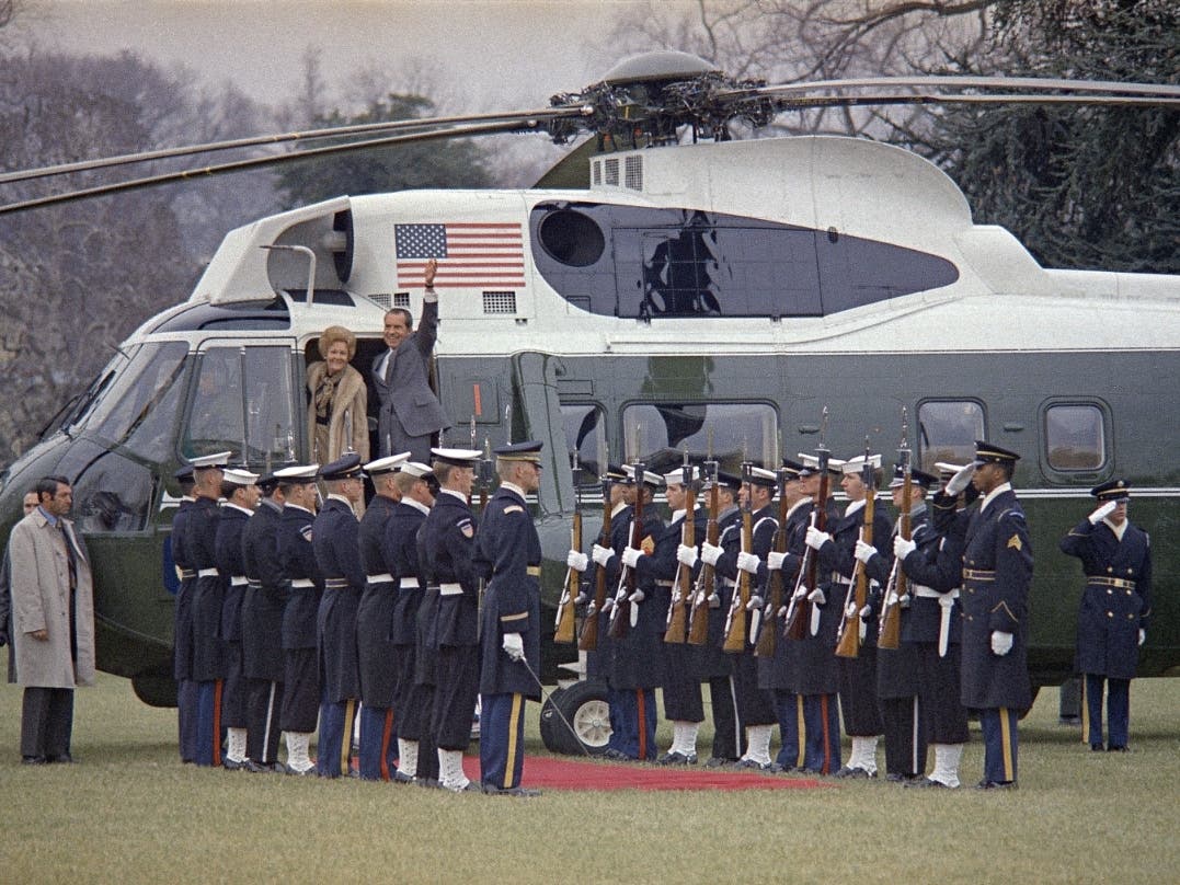 President Richard M. Nixon and first lady Pat Nixon wave as they board their helicopter at the White House that will take them to Air Force One for their trip to China, Feb. 17, 1972.