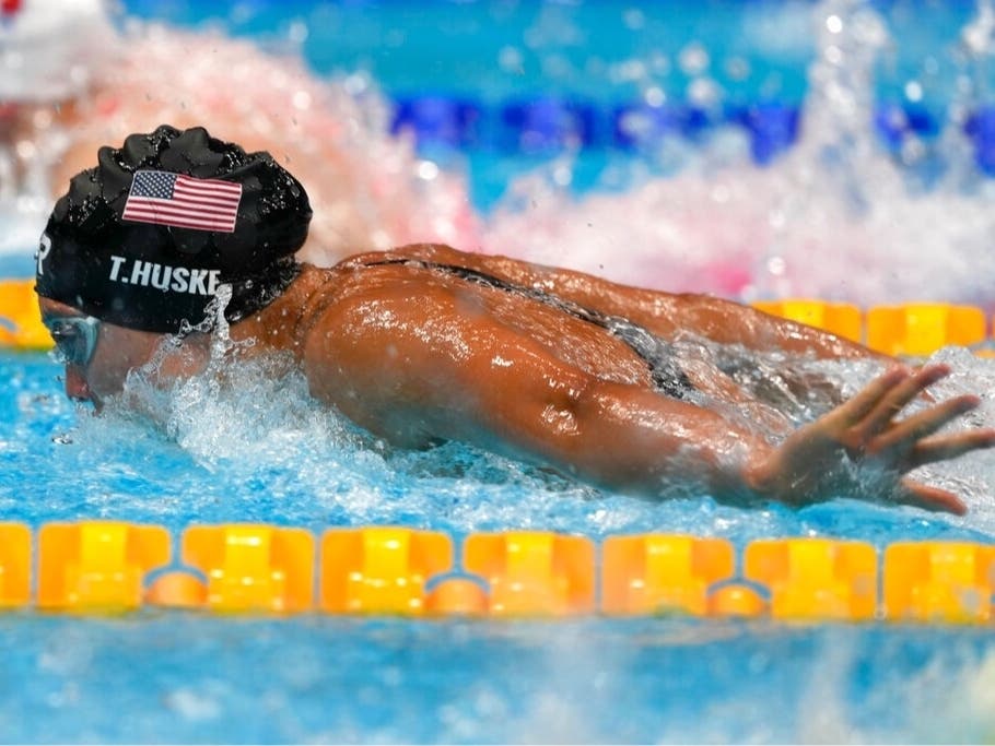 Torri Huske, of the United States, swims during a semifinal in the women's 100-meter butterfly at the 2020 Summer Olympics, Sunday, July 25, 2021, in Tokyo, Japan.