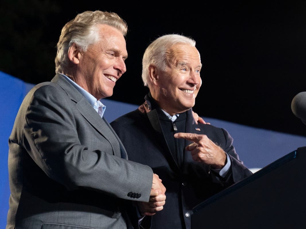 Former Virginia Gov. Terry McAuliffe (D), shown here with President Joe Biden on Oct. 26, 2021, hosted a garden party fund-raising event for Biden's reelection campaign.