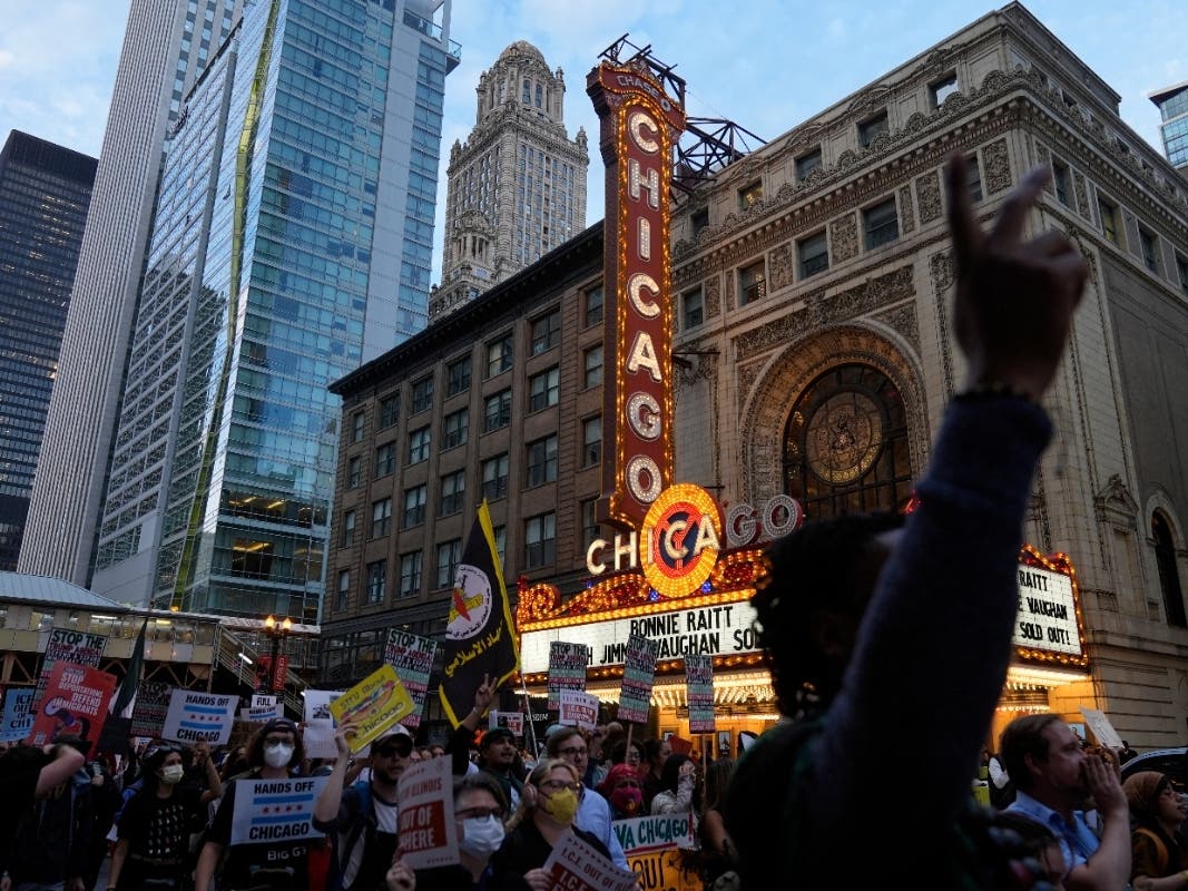 Demonstrators march at a protest opposing "Operation Midway Blitz" and the presence of ICE, Tuesday, Sept. 9, 2025, in Chicago.