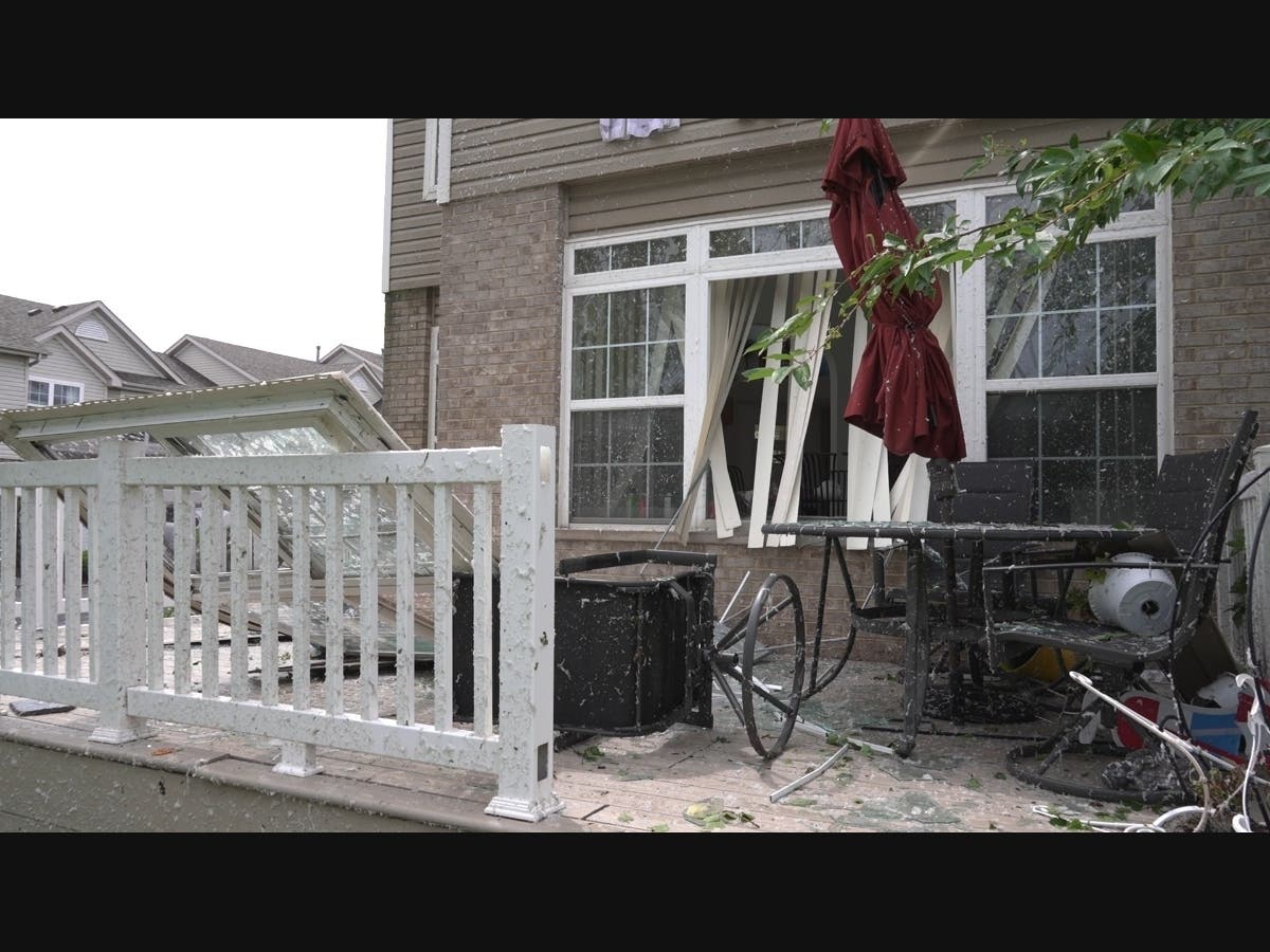 Damage caused by a strong storm is seen at a home in Tinley Park on Aug. 11.