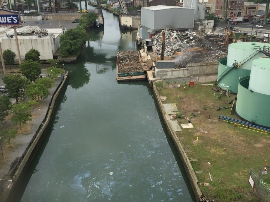 Oil slicks are visible on the Gowanus Canal's surface in this 2016 photo.