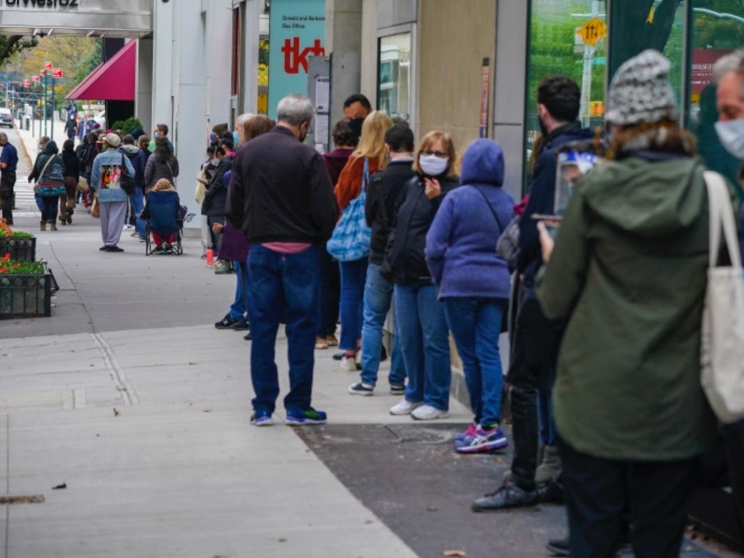 Long lines and poor weather didn’t stop New Yorkers from voting before Election Day on Tuesday.