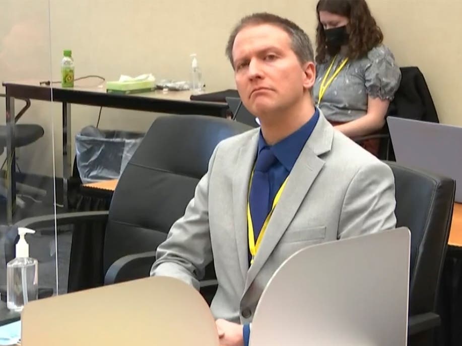 In this image from video, former Minneapolis police Officer Derek Chauvin listens as his defense attorney Eric Nelson gives closing arguments as Hennepin County Judge Peter Cahill presides Monday.