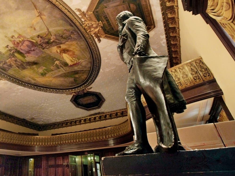 In this July 14, 2010, file photo, a statue of Thomas Jefferson, right, stands in New York's City Hall Council Chamber.