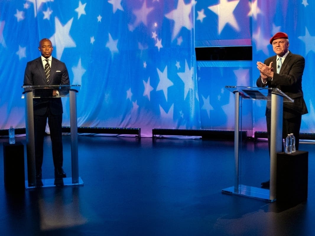 New York City Republican mayoral candidate Curtis Sliwa, right, engages Democratic mayoral candidate Eric Adams, during a debate at the NBC 4 New York studios on Oct. 20. 