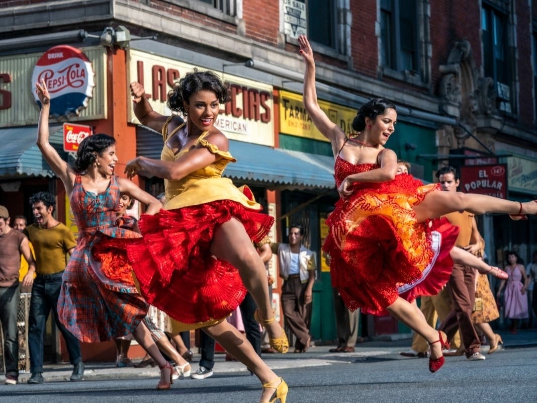 This image released by 20th Century Studios shows, from left, Ilda Mason as Luz, Ariana DeBose as Anita, and Ana Isabelle as Rosalia in "West Side Story."