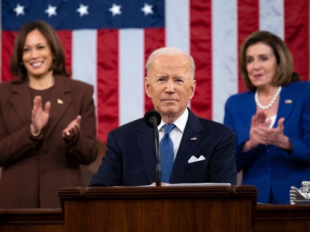 President Joe Biden delivers his first State of the Union address to a joint session of Congress at the Capitol, as Vice President Kamala Harris and House Speaker Nancy Pelosi watch Tuesday.
