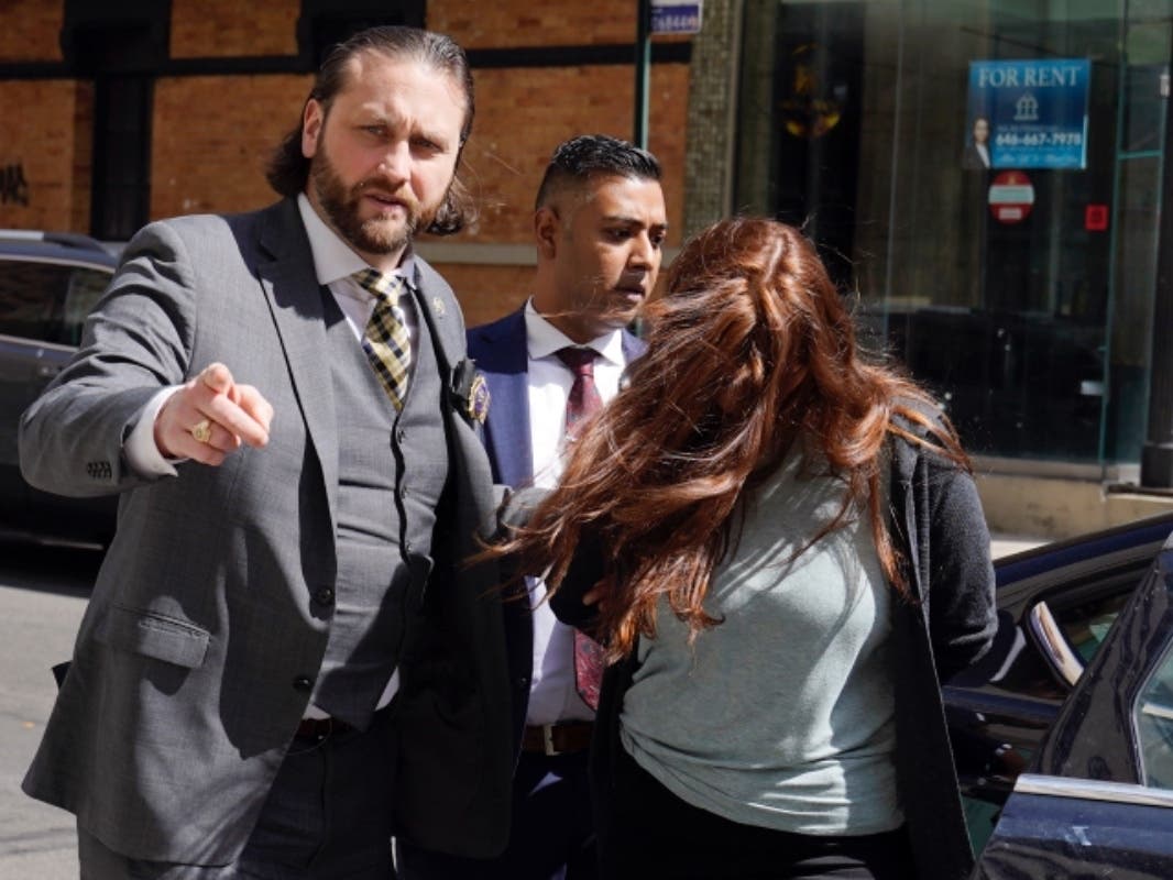 Lauren Pazienza, 26, of Port Jefferson, who was arrested in the death of a 87-year-old Broadway singing coach, arrives at court on March 22.