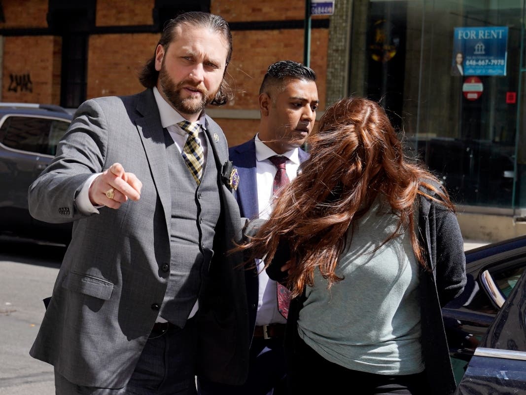 Lauren Pazienza, 26, of Port Jefferson, who was arrested in the death of an 87-year-old Broadway singing coach, arrives at court on March 22.