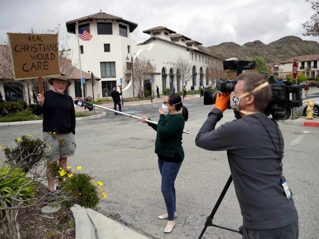 Andrew Goetze protests indoor Palm Sunday services at Calvary in April 2020.