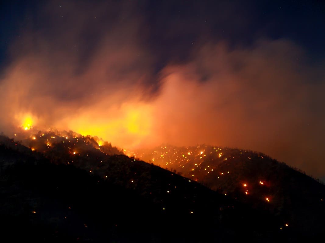 Crews are contending with steep terrain, high winds, low humidity and exceptionally dry vegetation. 
