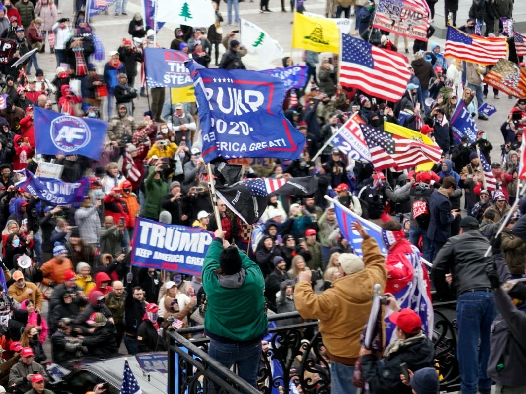 When law enforcement officers attempted to clear the crowd, Tyng Yang forcibly interfered by physically grabbing hold of an officer’s baton, according to police.