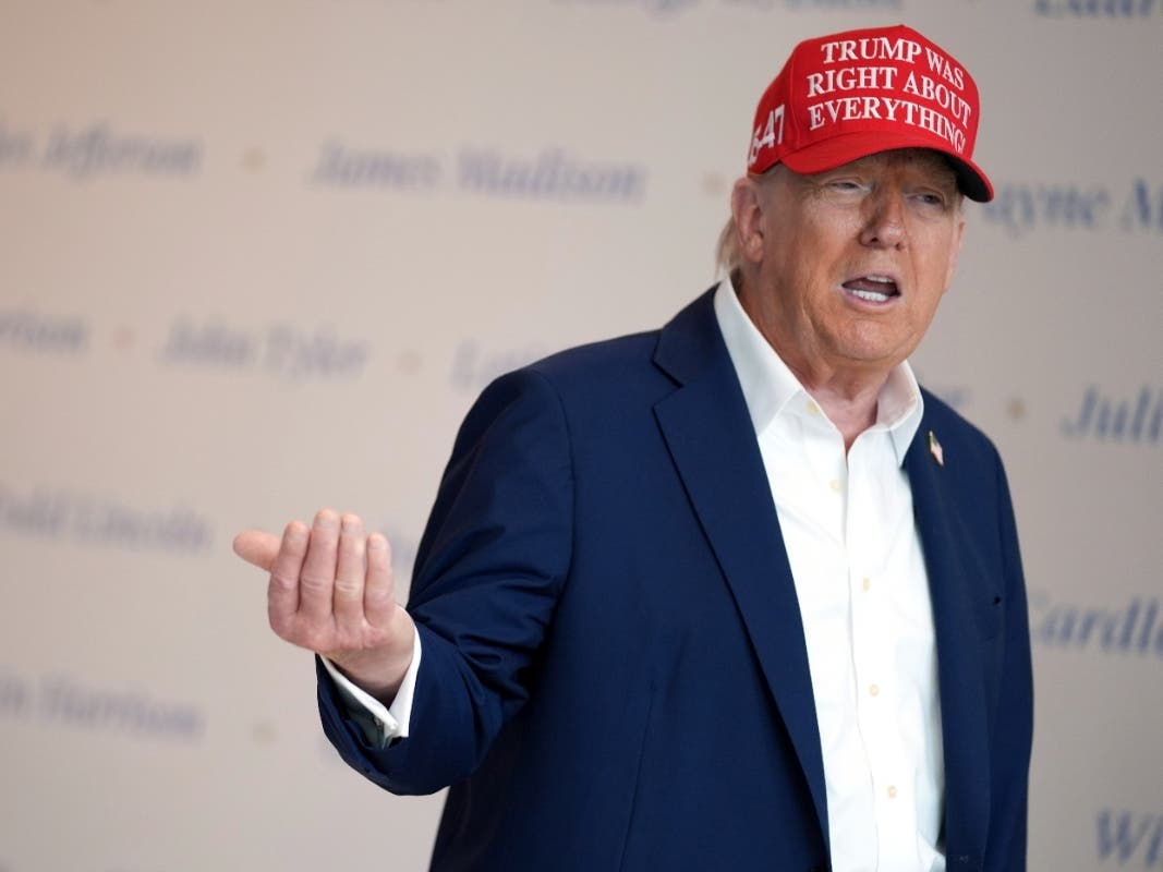 President Donald Trump speaks at The People's House museum on Friday in Washington. 