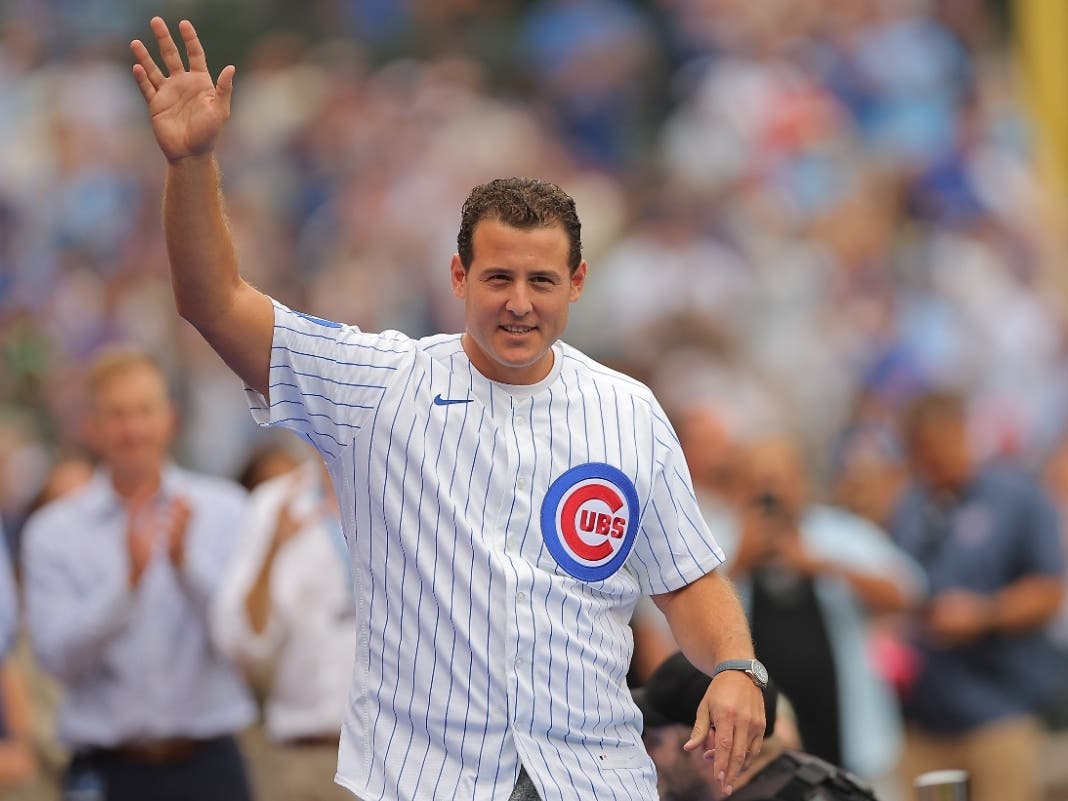 Former Chicago Cubs' Anthony Rizzo acknowledges the crowd before a baseball game against the Cincinnati Reds during the Chicago Cubs 150th anniversary celebration on Aug. 29 in Chicago.