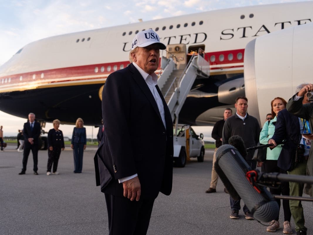 President Donald Trump speaks with reporters before boarding Air Force One at Shannon Airport, Sunday, in Shannon, Ireland.