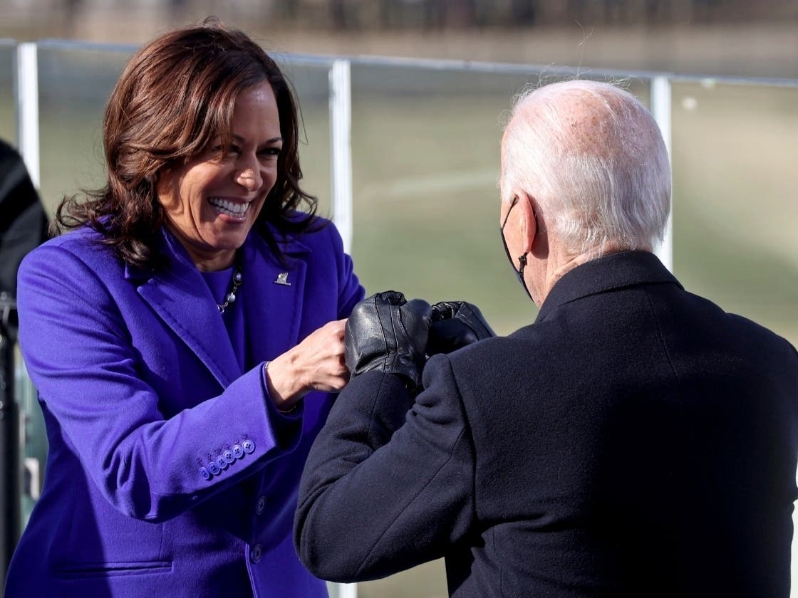 Vice President Kamala Harris bumps fists with President-elect Joe Biden after she was sworn in during the inauguration, Wednesday, Jan. 20, 2021, at the U.S. Capitol in Washington.