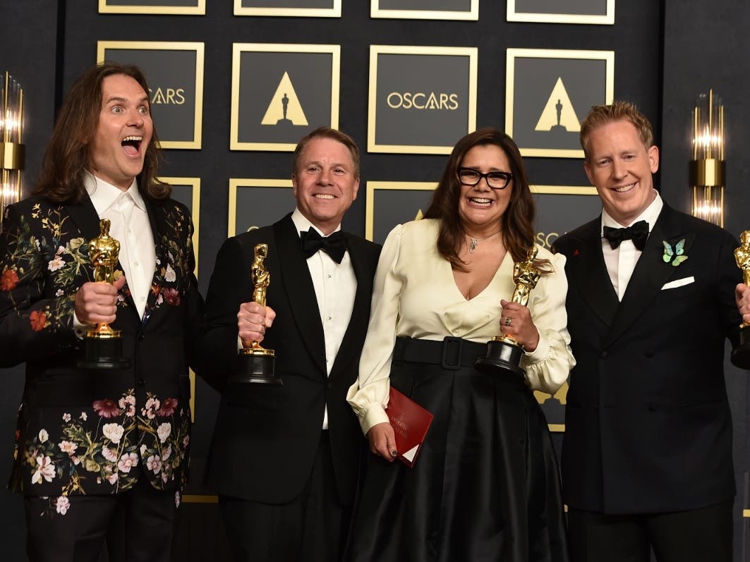 From the left, Bryon Howard, Clark Spencer, Yvett Merino and Jared Bush smile after winning an Academy Award on Sunday for their work on "Encanto." Bush is from Gaithersburg. This local Oscar win was one of the top Maryland stories of the week.