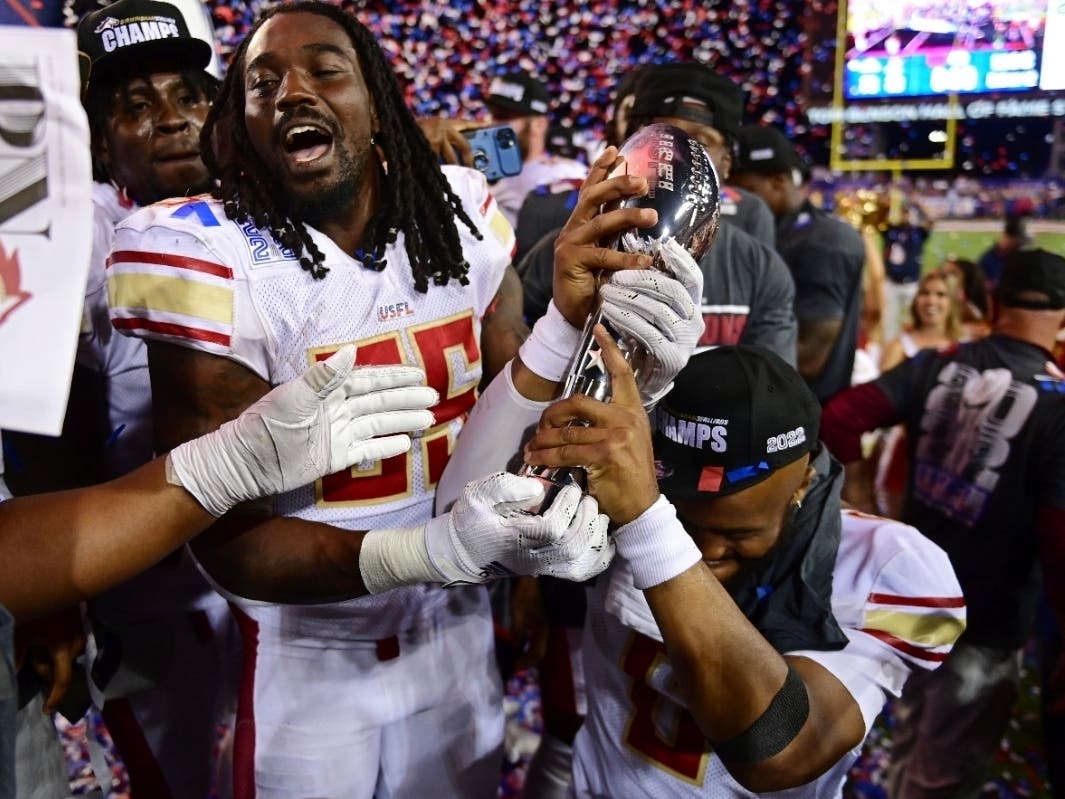 Birmingham Stallions running back Bo Scarbrough, left, and quarterback J'Mar Smith celebrate after the Birmingham Stallions defeated the Philadelphia Stars 33-30 of a USFL football game for the league championship, Sunday, July. 3, 2022, in Canton, Ohio