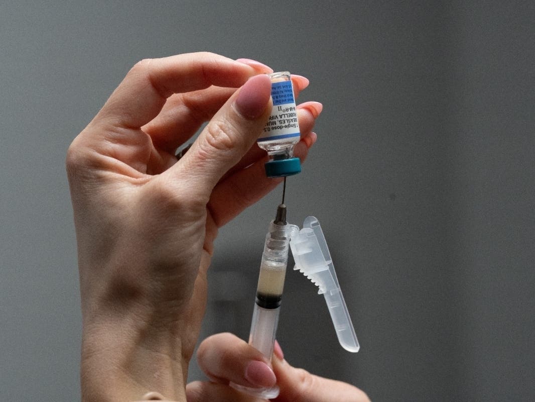 Lauren Ellenburg, a nurse, prepares a combination measles, mumps and rubella vaccine for a patient at Tiger Pediatrics in Easley, S.C., March 17, 2026.