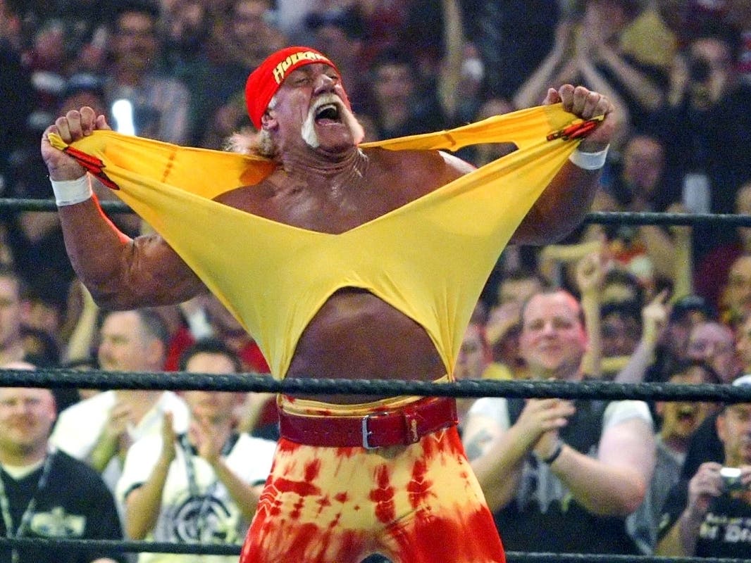 Famed wrestler Hulk Hogan fires up the crowd between matches during WrestleMania 21 in Los Angeles, April 3, 2005.