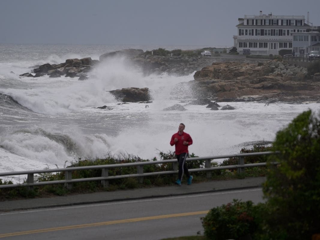 Surf breaks on the rocky coastline during the early stages of a nor'easter storm, Friday, Sept. 25, 2026, in Gloucester, Mass.