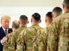 President Donald Trump participates in a ceremony Monday recognizing the California National Guard at Sacramento McClellan Airport, in McClellan Park, Calif.