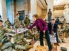 Rep. Vicky Hartzler, R-Mo., and Rep. Michael Waltz, R-Fla., hand pizzas to members of the National Guard gathered at the Capitol Visitor Center, Wednesday, Jan. 13, 2021, in Washington. 