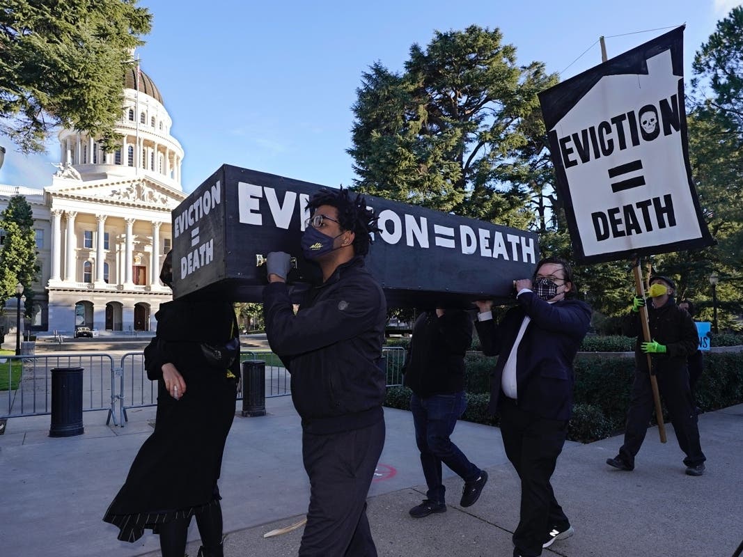 Demonstrators call for lawmakers and Gov. Gavin Newsom to pass rent forgiveness and stronger eviction protections legislation in Sacramento, California, on Monday.