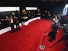 Anderson .Paak, left, and Bruno Mars arrive at the 63rd annual Grammy Awards at the Los Angeles Convention Center on Sunday, March 14, 2021.