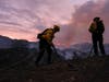 Firefighters watch as smoke rises from a brush fire that scorched at least 100 acres in the Pacific Palisades area of Los Angeles May 15.