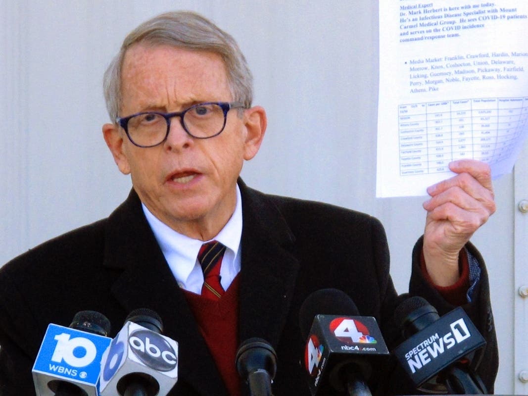 Republican Ohio Gov. Mike DeWine talks about data on Ohio's coronavirus cases during a news briefing in November 2020 in Columbus, Ohio.