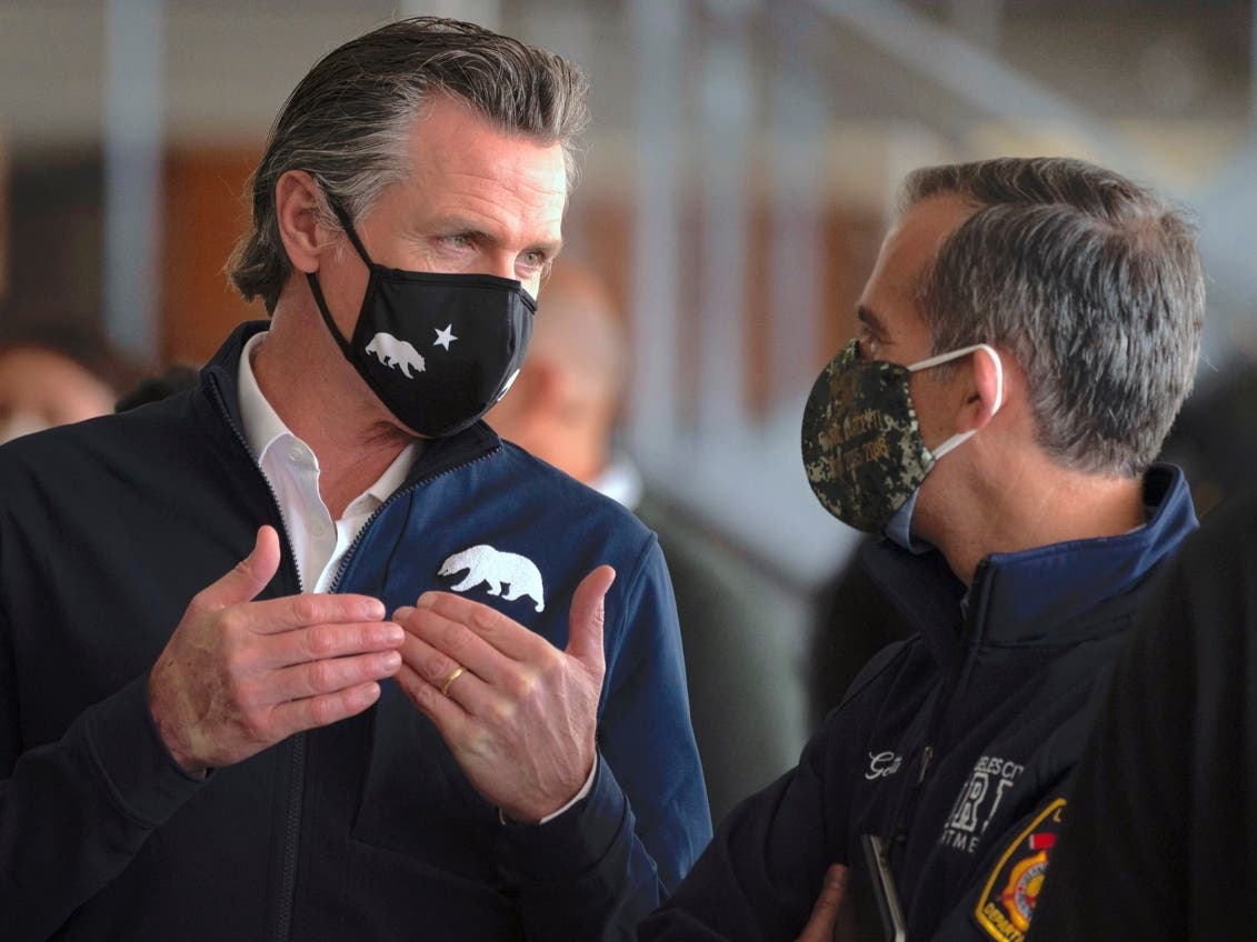 Newsom is facing new criticism for shedding his face mask, rekindling a politically sensitive issue that has shadowed the Democratic governor since he was caught without a face covering at a private 2020 party that defied his own pandemic safety orders. 