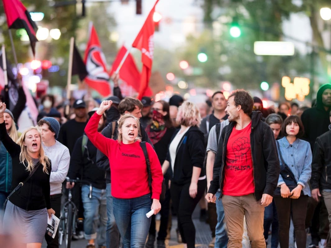 Protesters against racism march through Oakland, Calif., Saturday, Aug. 12, 2017.