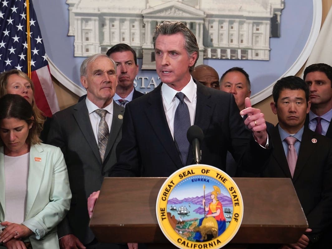  Flanked by lawmakers from both houses of the state legislature, Gov. Gavin Newsom said he is ready to sign more restrictive gun measures passed by lawmakers.