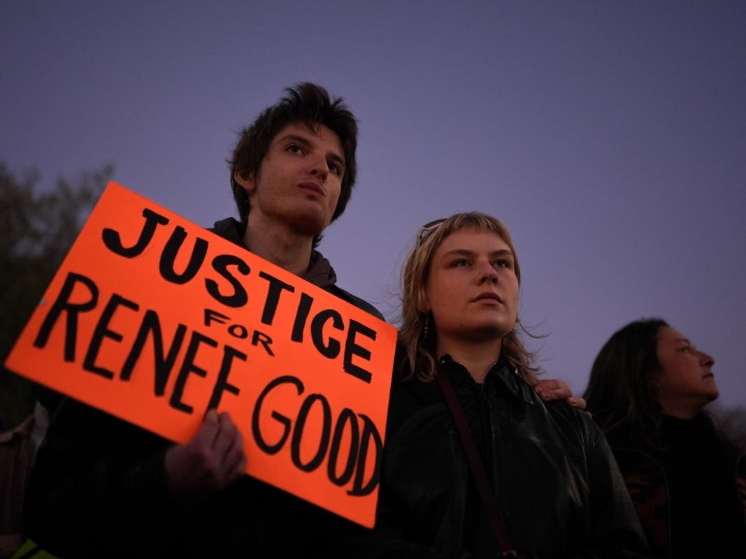 Albert Melloy, left, and Ashley Gustafson attend a protest in Los Angeles, Thursday, Jan. 8, 2026, following the death of Renee Good, who was fatally shot by an ICE officer.