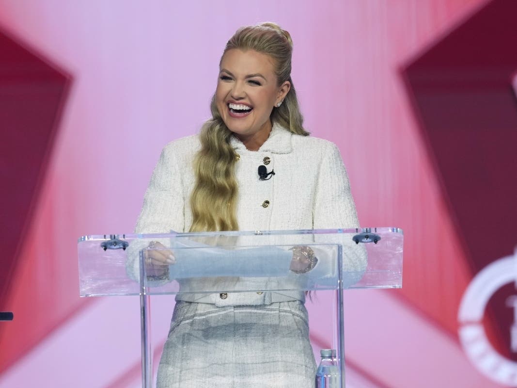 Erika Kirk smiles during Student Awards at Turning Point USA's AmericaFest 2025, Saturday, Dec. 20, 2025, in Phoenix.
