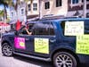 Protestors drove past Manatee County Commissioner Vanessa Baugh's retail jewelry shop, Vanessa Fine Jewelry, during Saturday's Lakewood Ranch car parade. 
