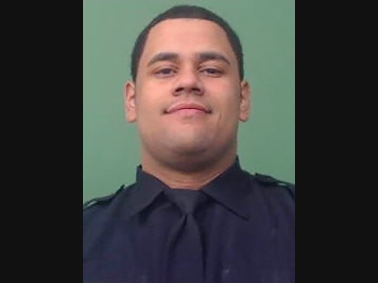 In an undated photo provided by the New York City Police Department, NYPD Officer Wilbert Mora, who was involved in a police shooting, Friday, Jan. 21, 2022, in New York City, is shown.