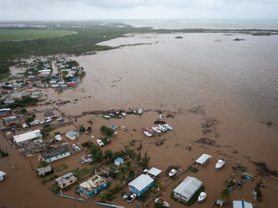 Homes are flooded on Salinas Beach after the passing of Hurricane Fiona in Salinas, Puerto Rico, Monday, Sept. 19, 2022. 