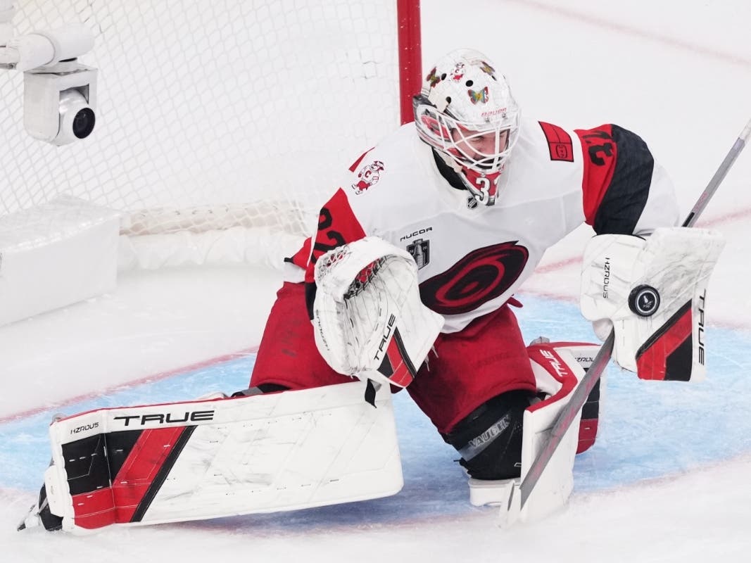 Carolina Hurricanes goaltender Brandon Bussi (32) stops a shot on goal during the second period in Game 6 of the NHL hockey Stanley Cup Final series against the Vegas Golden Knights, Sunday, June 14, 2026, in Las Vegas.