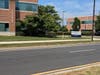 As you approach from the south, here is the view of the building that houses the offices of TMGA, Inc. in Germantown, MD.  The letters "TMGA" are absent. The building number you're looking for (20440) does not appear on the building's sign.
