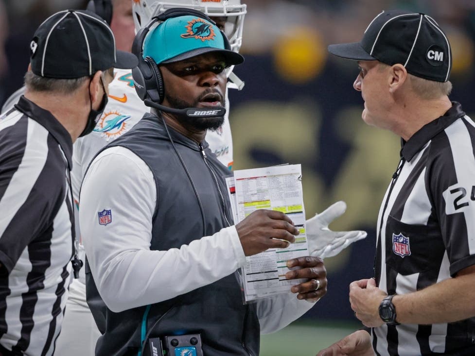Fired Miami Dolphins Coach Brian Flores sued the NFL and three of its teams in federal court Tuesday saying racist hiring practices by the league have left it racially segregated and managed like a plantation.