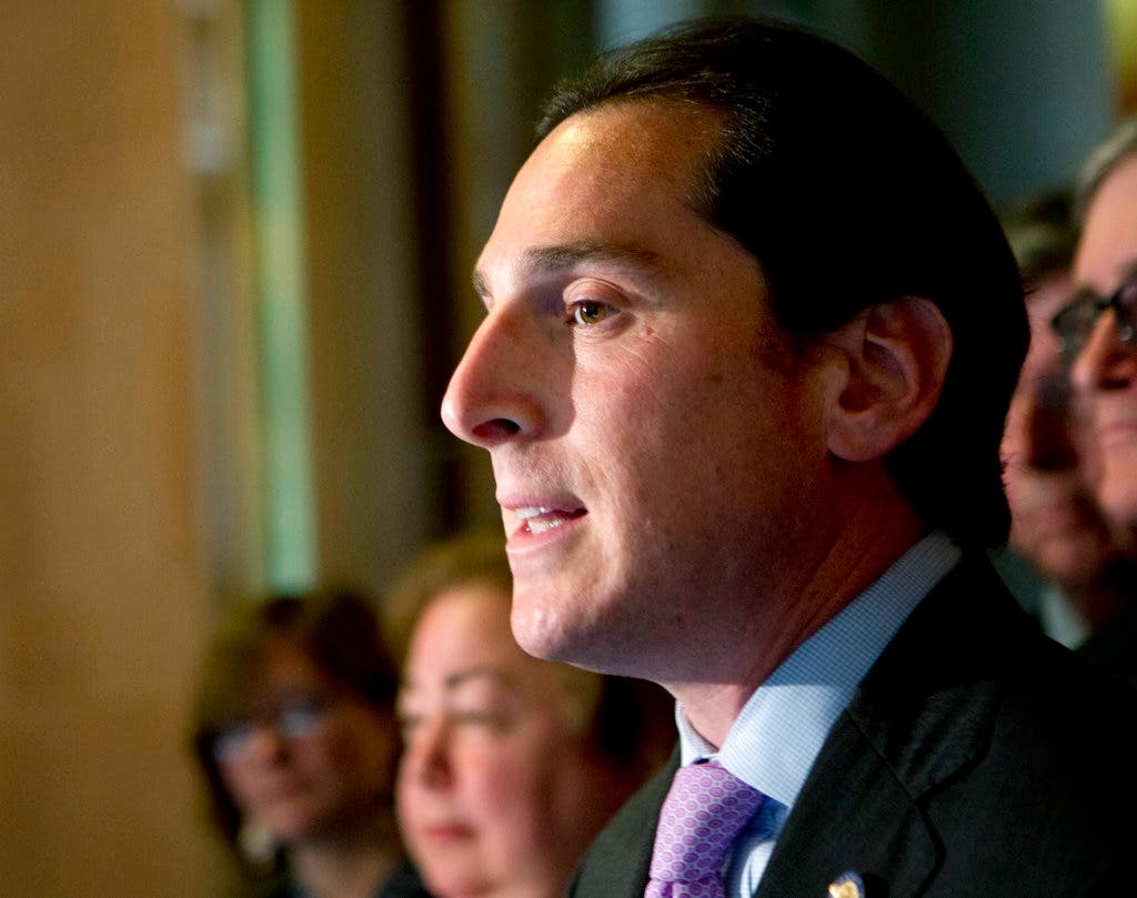 A state senator was accused in a lawsuit of being power hungry.