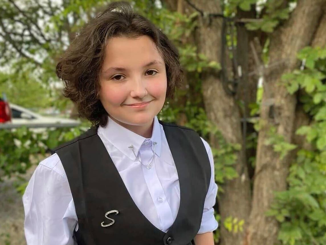 Nex Benedict poses outside the family's home in Owasso, Okla., in December 2023. Benedict, a nonbinary Oklahoma student, died a day after a high school bathroom fight that may have been prompted by bullying. A vigil in their honor is planned in Stamford.
