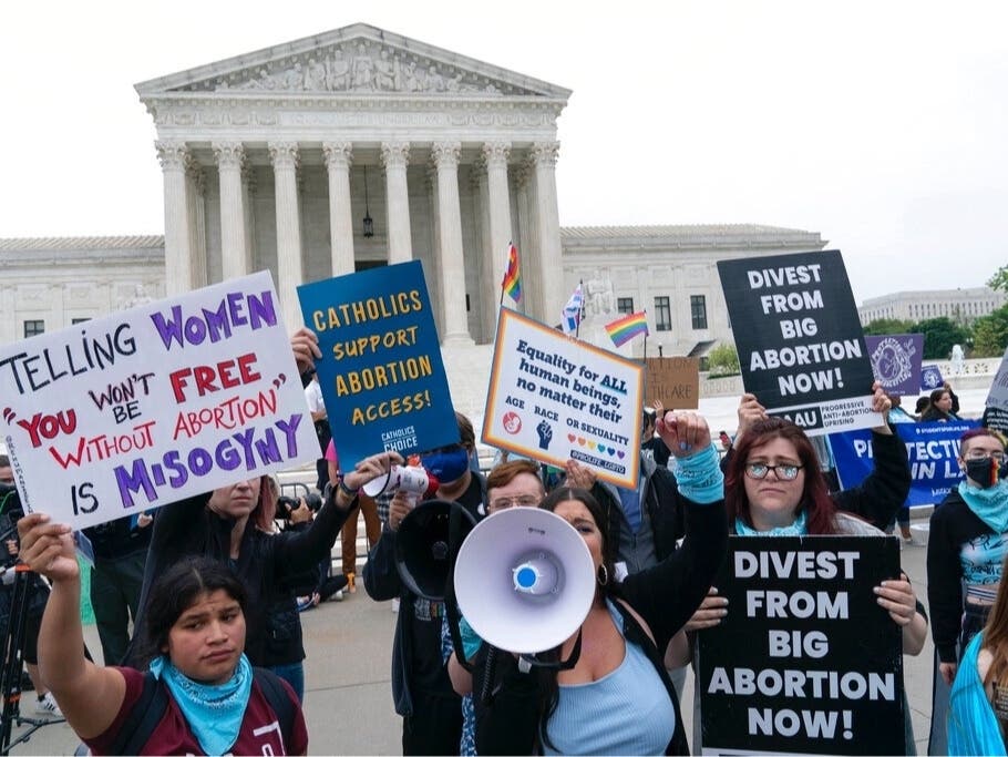 Demonstrators protest outside of the U.S. Supreme Court Tuesday, May 3, 2022 in Washington. Pittsburgh activists are planning a rally in support of Roe v. Wade on Saturday. 