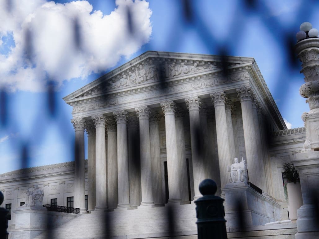 The U.S Supreme Court is seen in the evening on Monday, July 18, 2022. Bonnie Watson Coleman (D-NJ-12) was one of 17 members of Congress arrested Tuesday while participating in a sit in with activists from Center for Popular Democracy Action. 